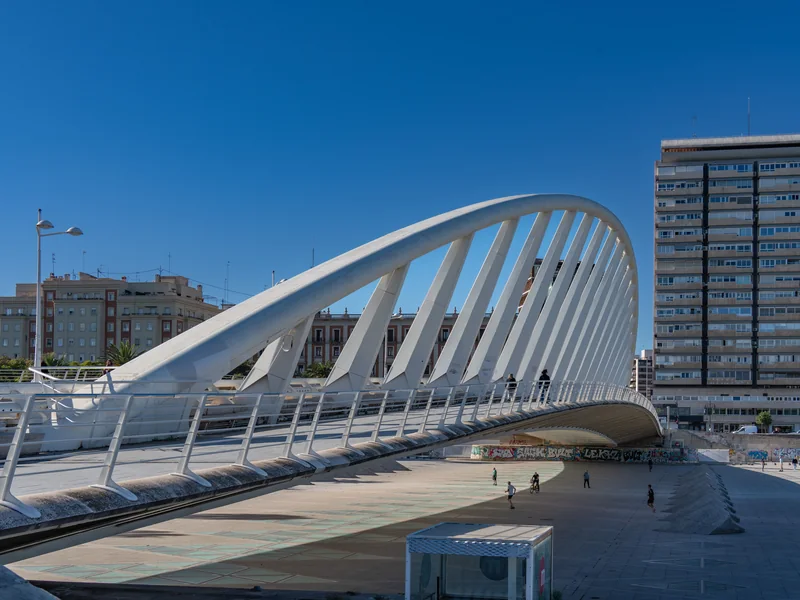 Modern bridge in Valencia under a clear blue sky